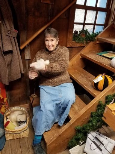 spinning wool with a drop spindle